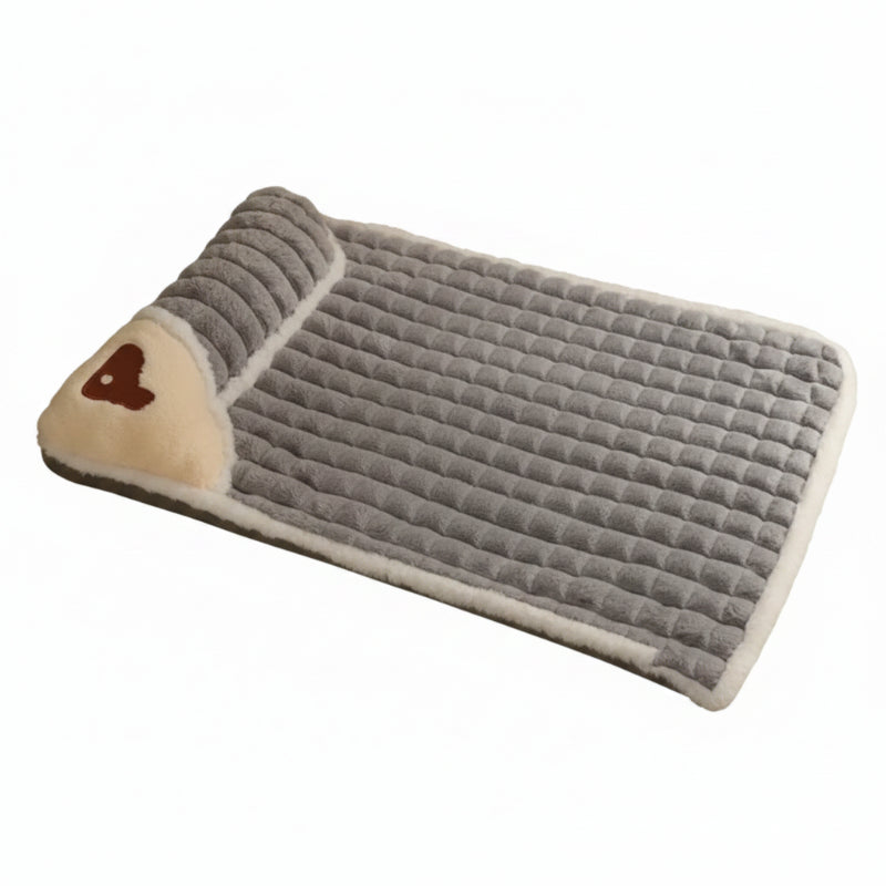 Gray pet bed with a heart design on a white background