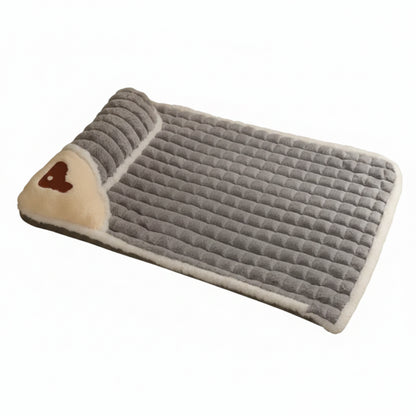 Gray pet bed with a heart design on a white background