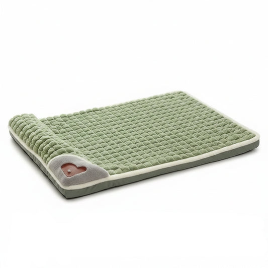 Green pet bed on a white background