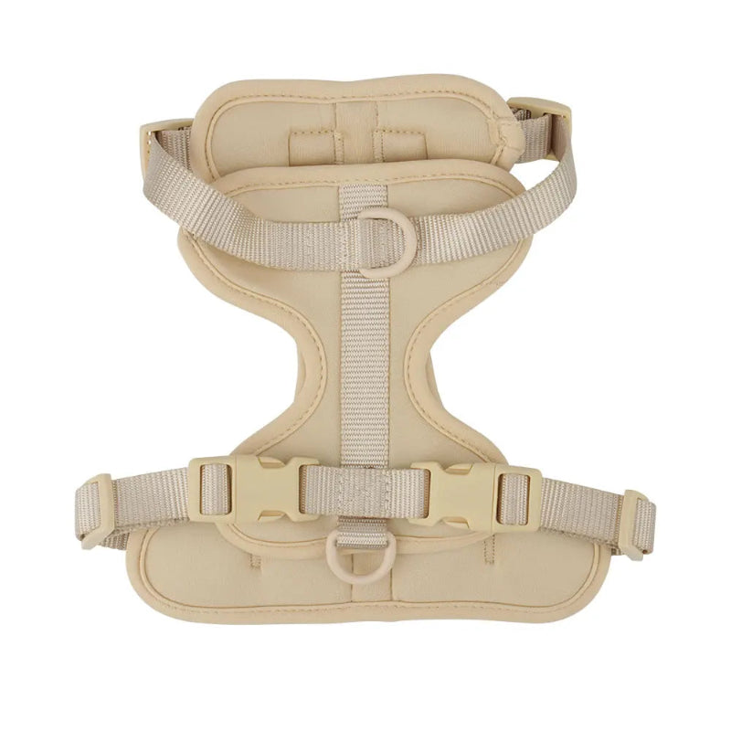 Beige dog harness on a white background